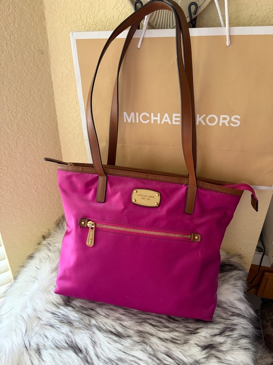 Michael Kors Handbags - Michael Kors fuchsia is Nylon Tote with Brown Leather Trim